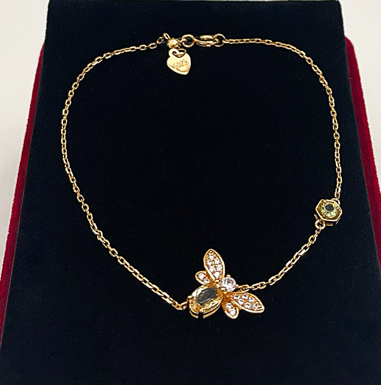 Close-up of citrine bracelet showing faceted yellow stones shimmering with natural brilliance.