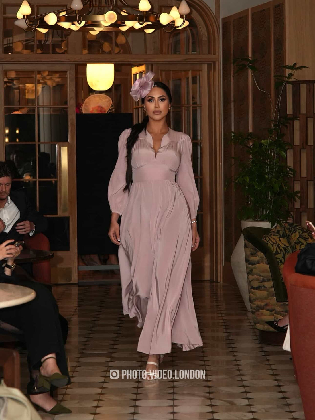 Model wearing a handcrafted pink silk dress by Moda de la Maria, slow fashion made in London.