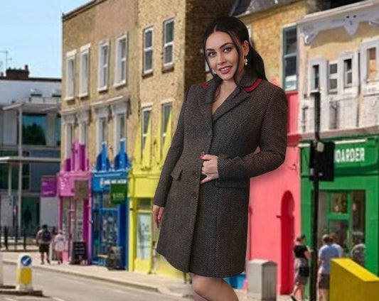 Model wearing a handcrafted brown tweed coat by Moda de la Maria in London, sustainable womenswear inspired by heritage and modernity.