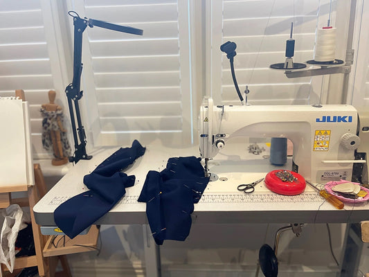 andcrafted navy wool fabric cut by hand in a slow fashion atelier in London