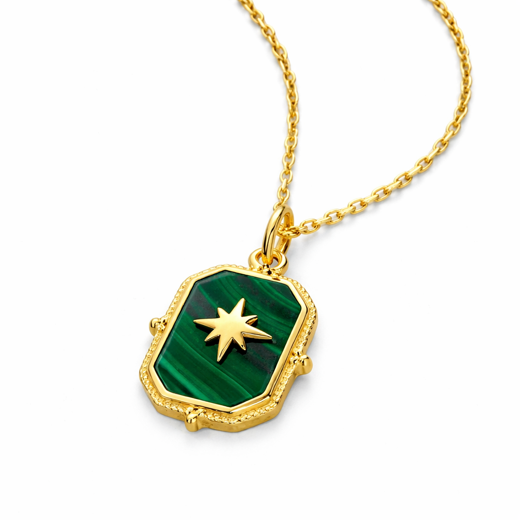 Luxury malachite gemstone necklace with delicate gold chain, handcrafted 925 sterling silver piece for timeless, understated style. 
