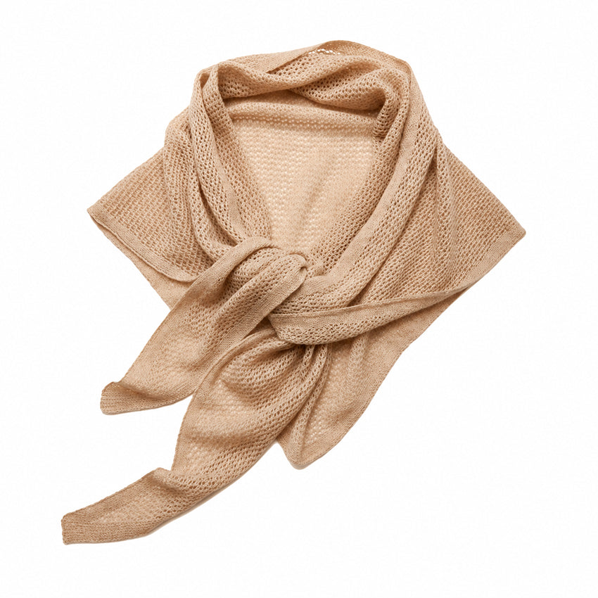 Luxury women's 100% pure cashmere beige knitted triangle scarf by Moda de la Maria. Soft, lightweight, premium cashmere scarf handcrafted for timeless British luxury fashion, elegant layering, travel, autumn and winter styling.