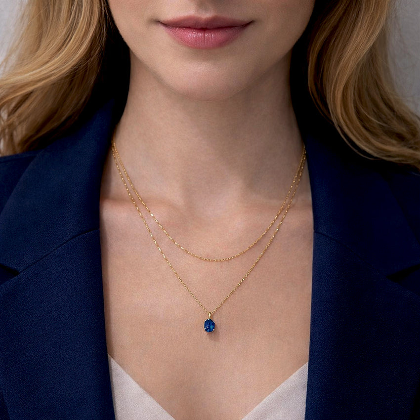 Elegant blue sapphire stone set in sterling silver necklace, handcrafted luxury jewellery detail
