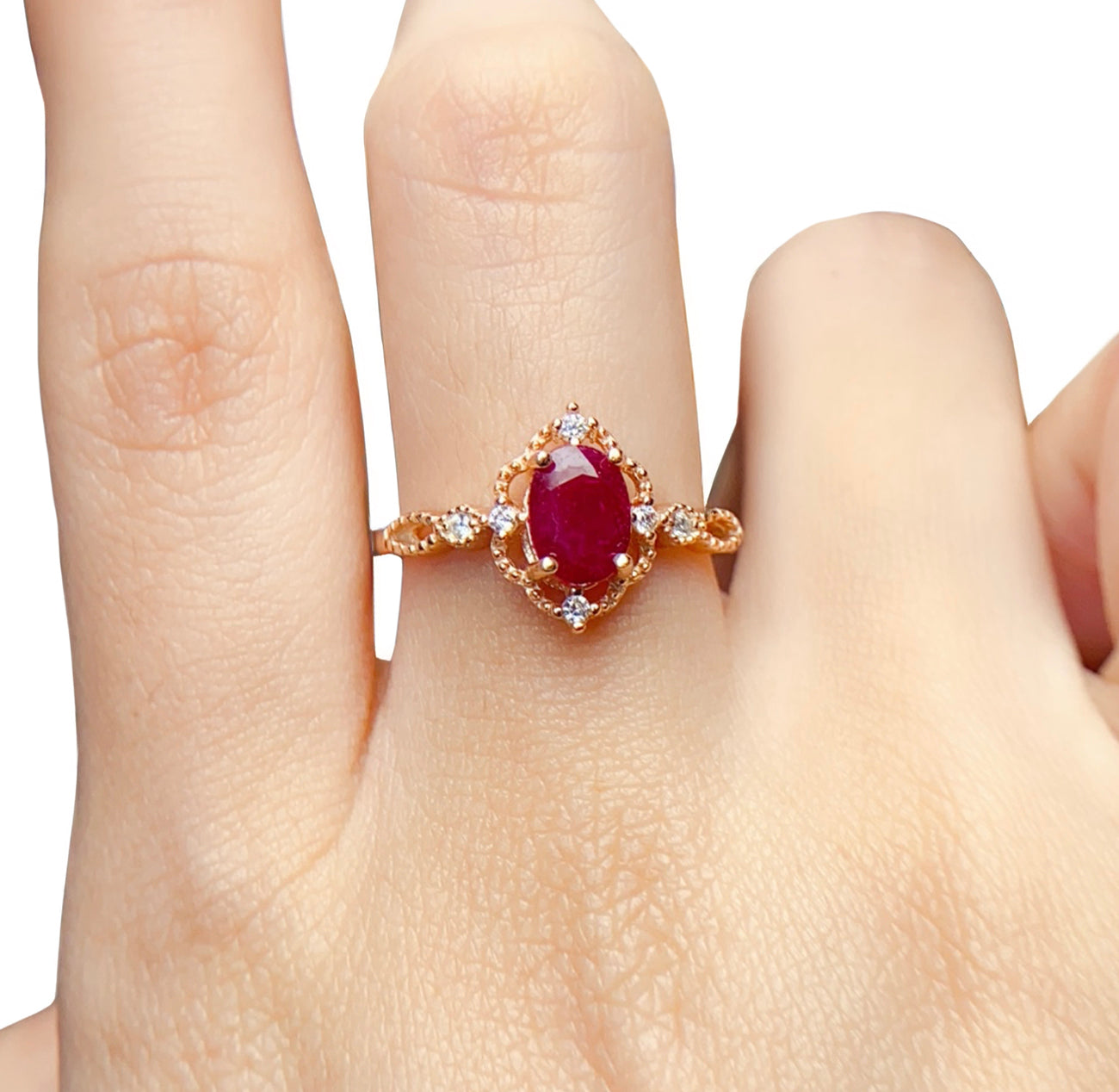 Women’s natural ruby ring worn on hand, elegant rose gold fine jewellery by Moda de la Maria.