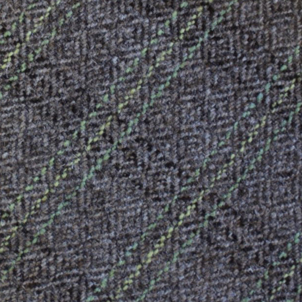 Close-up of luxury tweed wool fabric in grey with subtle green stripe, Moda de la Maria.”