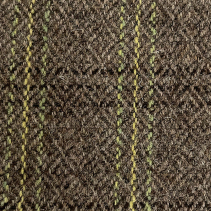 ou can add alt text like “Close-up of luxury tweed wool fabric in diamond twill with green stripe detail, Moda de la Maria” to capture extra search visibility.
