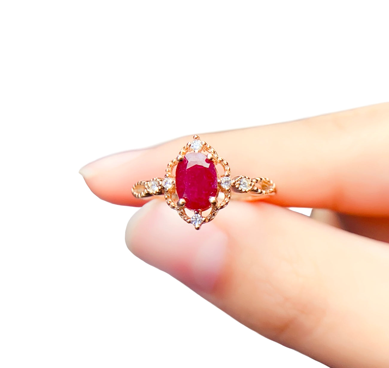 Natural ruby oval ring in 18K rose gold plated 925 silver with vintage halo design by Moda de la Maria.