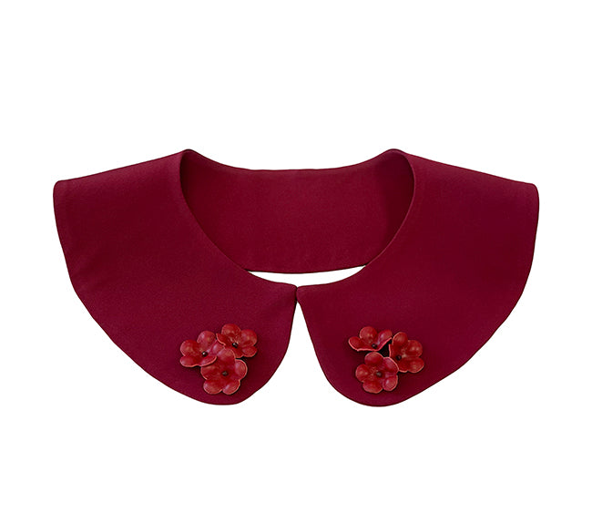 Luxury women’s accessory crafted from 100% heavy silk with leather flower embellishments and natural garnet stones, sustainable fashion handmade in London.