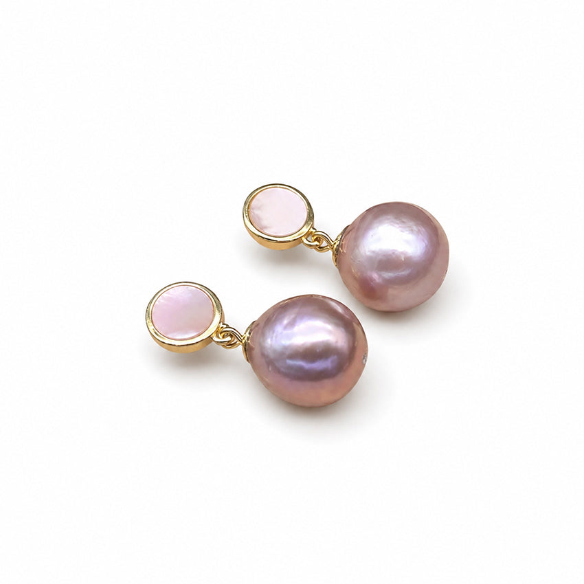 Baroque freshwater pearl drop earrings with a gold-plated setting on a white background, handcrafted luxury pearl jewellery featuring natural iridescent freshwater pearls.
