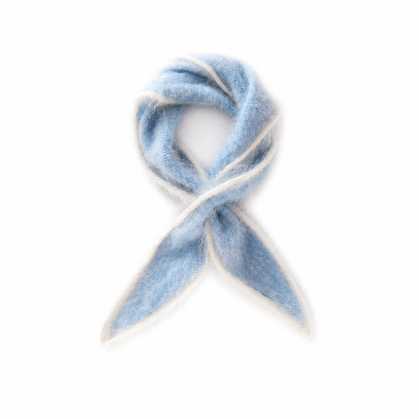Soft blue cashmere triangle scarf with cream contrast edging and fluffy knitted finish
