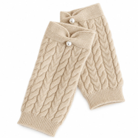 Cream pure cashmere fingerless gloves with cable knit, bow cuff and pearl detail by Moda de la Maria.