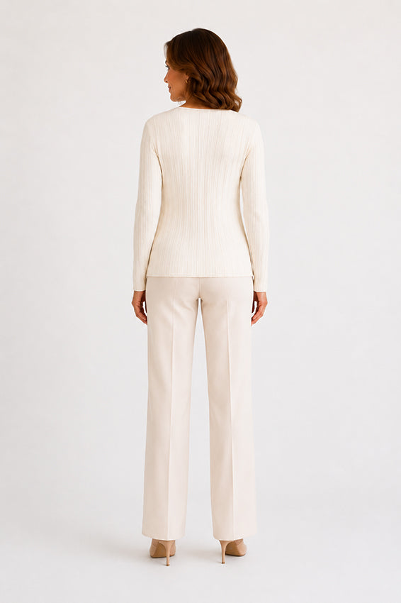 Back view of cream ribbed knit top designed for timeless everyday elegance.