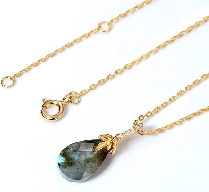 Fine gold chain necklace with labradorite pendant, understated luxury jewellery with natural gemstone and clean modern aesthetic
