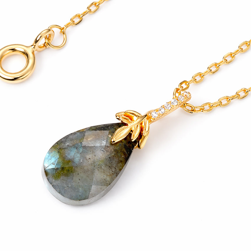 Close-up of Labradorite teardrop pendant necklace in gold-plated sterling silver with fine chain and natural blue-green gemstone detail