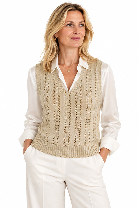 Woman wearing a luxury natural cashmere V-neck knitted vest with openwork detailing by Moda de la Maria
