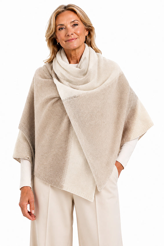 Moda de la Maria 100% pure cashmere colour block scarf in cream and oatmeal, styled on a mature woman wearing a luxury soft cashmere shawl.

