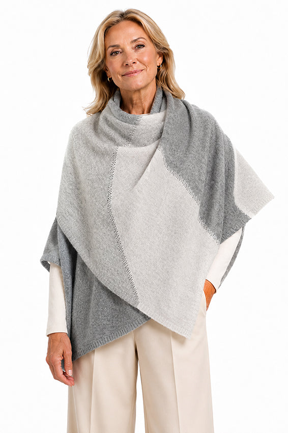 Moda de la Maria 100% pure cashmere colour block scarf in silver grey and cream, styled on a mature woman wearing a luxury soft cashmere shawl.