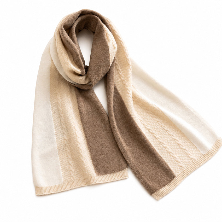 Close-up of the Moda de la Maria 100% pure cashmere cream and taupe scarf, showcasing the luxurious soft texture, cable knit detail and premium craftsmanship.
