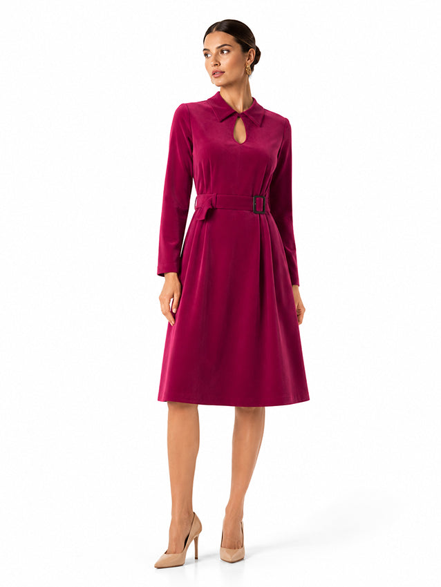 Elegant burgundy silk midi dress with long sleeves and belted waist on brunette model against a white background by Moda de la Maria