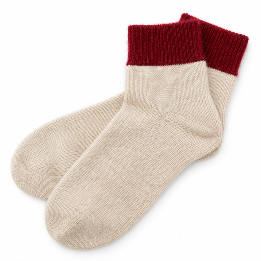 Ivory cream 100% pure cashmere ankle socks with deep red ribbed cuffs by Moda de la Maria.