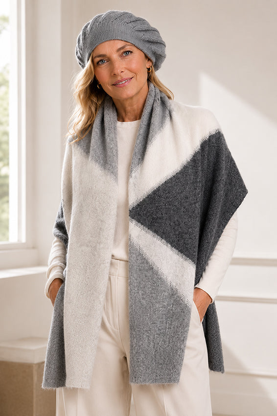 Luxury women's 100% pure cashmere grey beret with grey and ivory colour-block cashmere scarf by Moda de la Maria. Soft premium knitted cashmere accessories handcrafted for timeless British luxury fashion and elegant autumn winter styling.