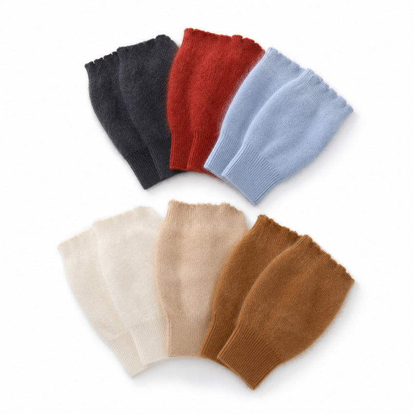 Close-up of the luxurious brushed texture of Moda de la Maria 100% pure cashmere fingerless gloves, showcasing the exceptionally soft natural cashmere fibres and premium craftsmanship.