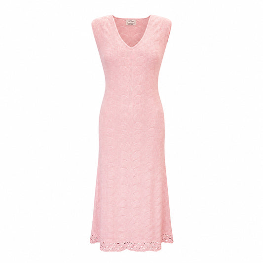 Soft pink cashmere crochet knit midi dress by Moda de la Maria isolated on a light background.
