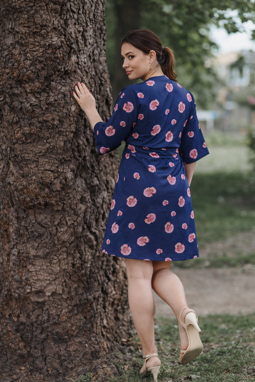 Back view of handmade navy cotton voile kimono wrap dress with pink poppy print and waist tie by Moda de la Maria