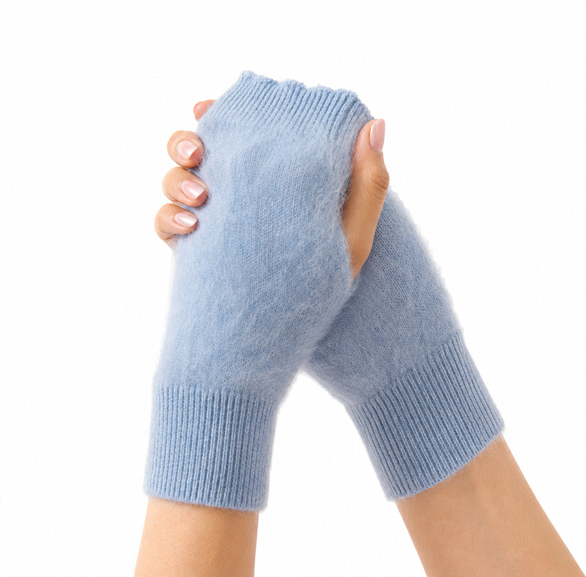 Luxury 100% pure cashmere brushed fingerless gloves in soft powder blue by Moda de la Maria, featuring an exceptionally soft brushed cashmere texture and elegant ribbed cuffs.