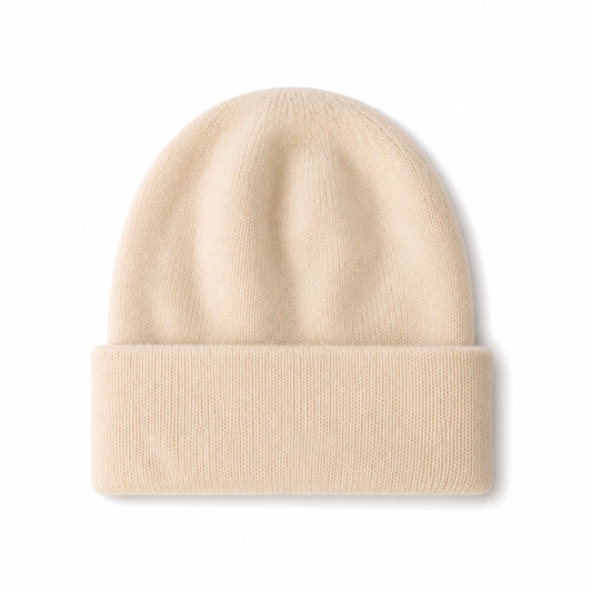 Luxury women's 100% pure cashmere cream beanie hat by Moda de la Maria, crafted from fine knitted cashmere with a soft, timeless silhouette.