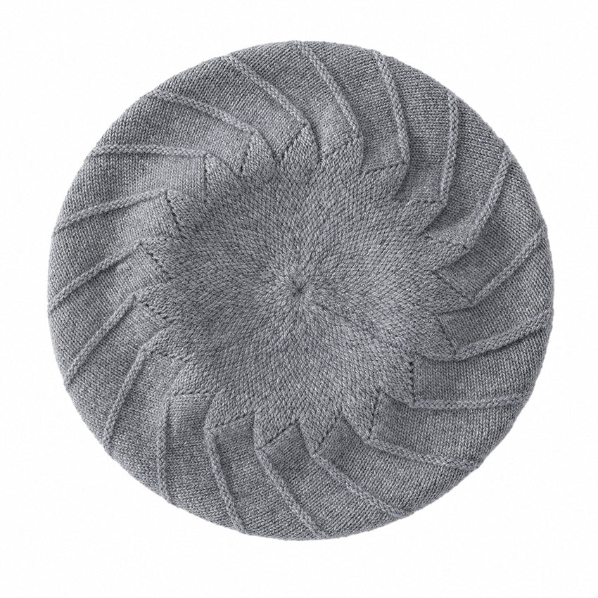 Luxury grey pure cashmere knitted beret featuring an elegant spiral knit design by Moda de la Maria.