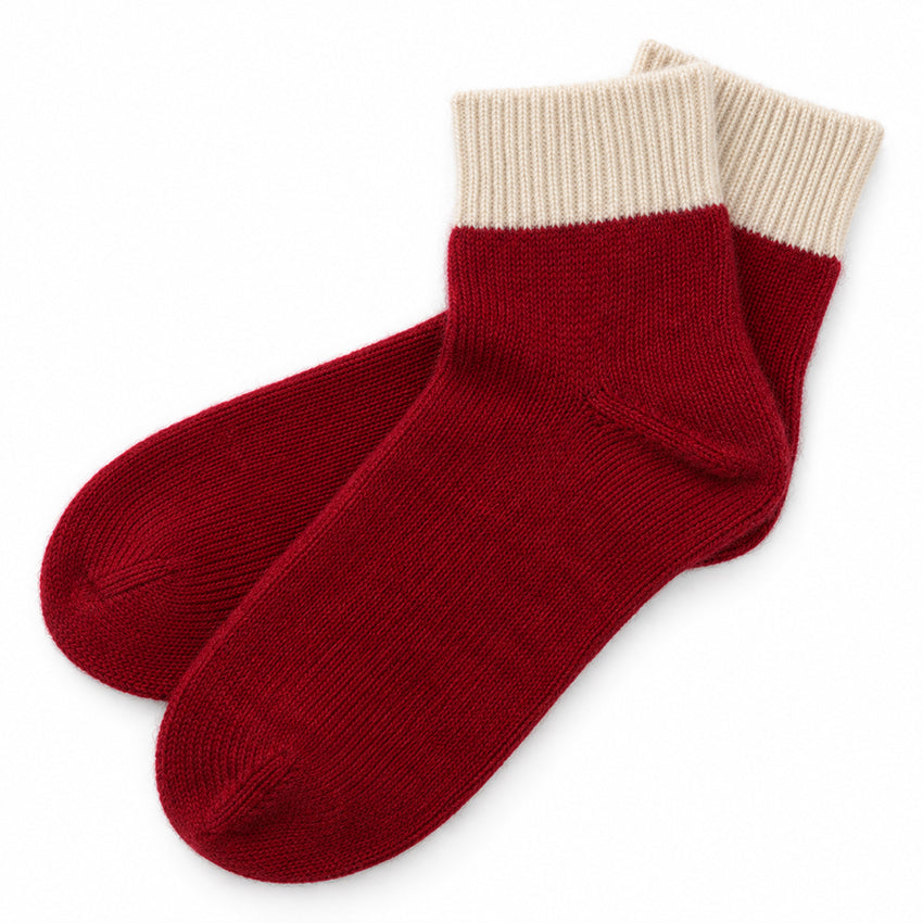 Deep red 100% pure cashmere ankle socks with ivory cream ribbed cuffs by Moda de la Maria.
