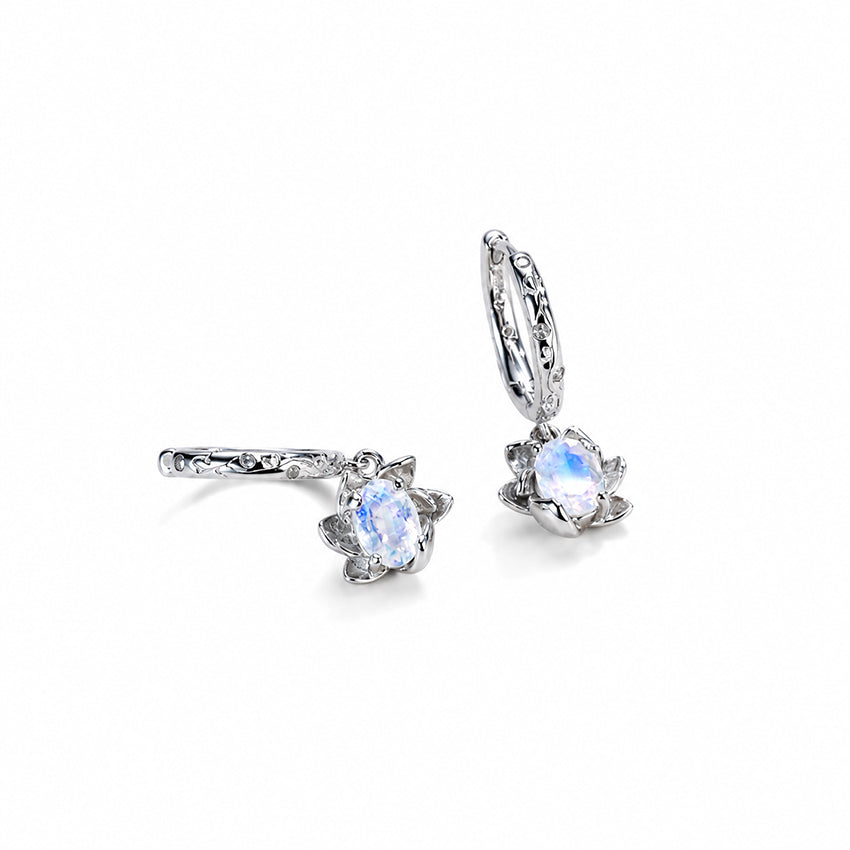 Sterling silver moonstone earrings showing oval gemstones, floral settings and engraved hoops