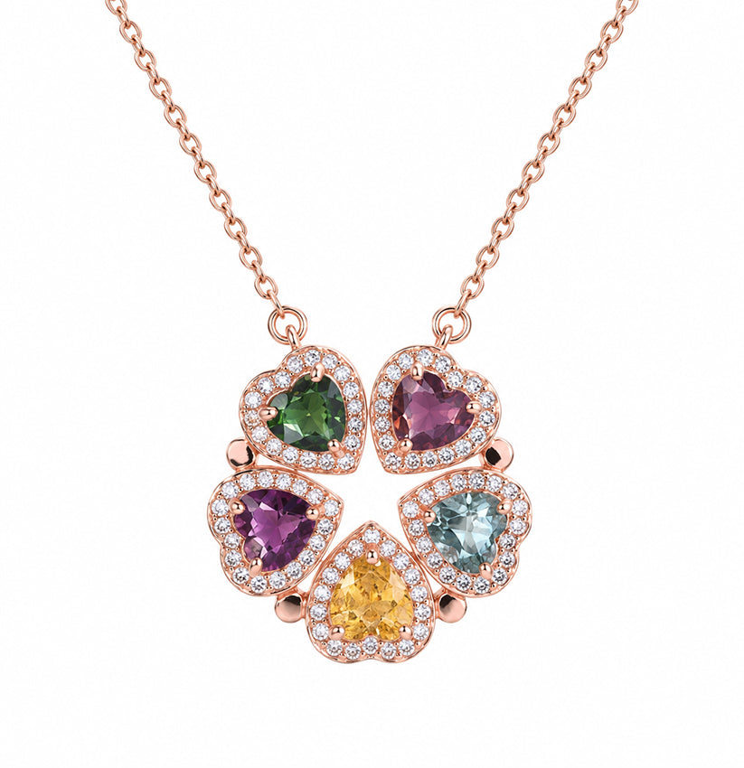 Multicolour heart gemstone rose gold necklace by Moda de la Maria, featuring five heart-shaped stones with sparkling halo settings.