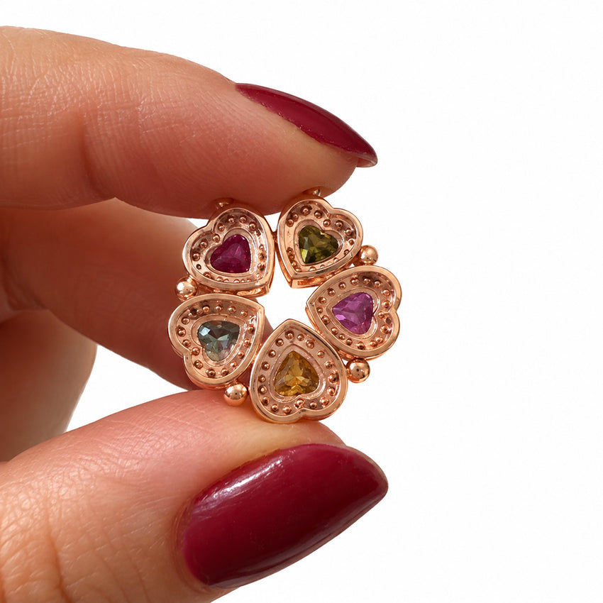 Close-up back view of the five-heart multicolour gemstone necklace, showing the detailed open settings and rose gold finish.