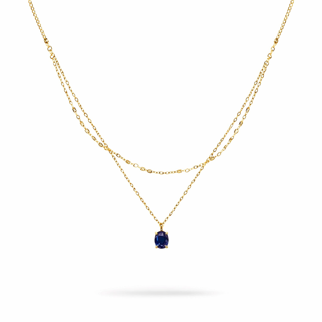 Real sapphire pendant necklace with delicate gold layered chains, elegant fine jewellery by Moda de la Maria on white background
