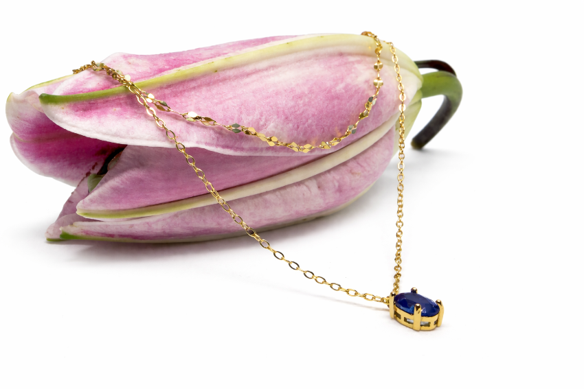 Natural sapphire pendant necklace in gold plated sterling silver styled with pink lily flower by Moda de la Maria