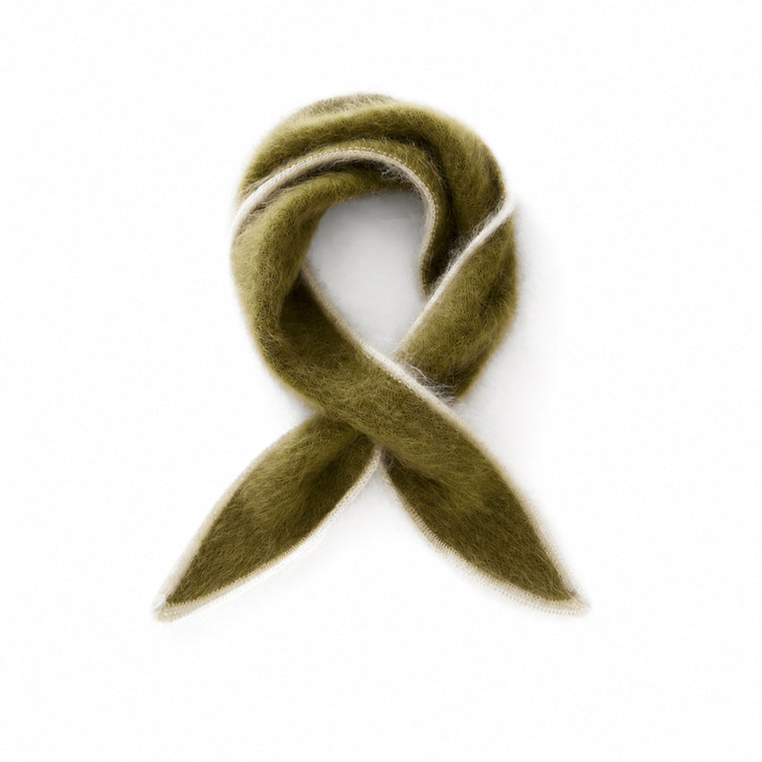 Olive green cashmere triangle scarf with cream contrast edging and soft fluffy texture