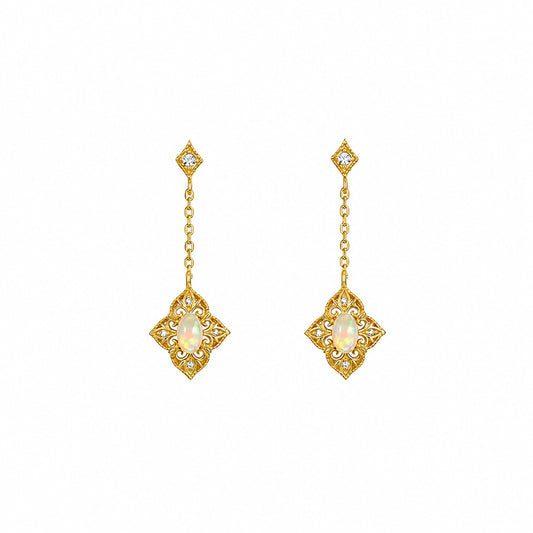 Gold-plated sterling silver opal drop earrings with Victorian-inspired filigree and zirconia detailing on a white background