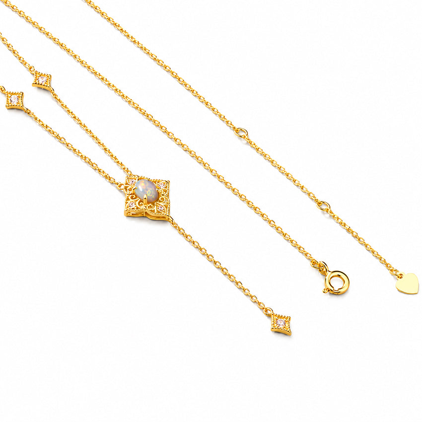 Gold-plated sterling silver opal necklace showing Victorian-style centrepiece, adjustable chain and clasp