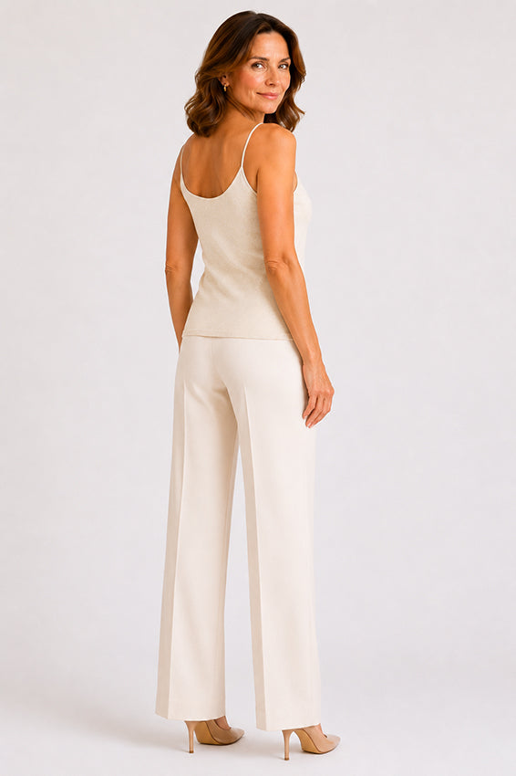 Back view of a luxury organic cashmere camisole in natural ivory showing delicate straps and neckline