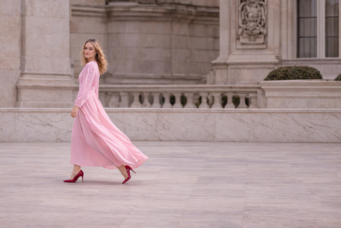 Luxury pink silk dress on marble architecture background, timeless handcrafted womenswear by Moda de la Maria London
