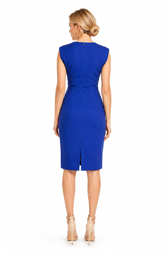 Classic, elegant blue pencil dress on a mature female model photographed beside a luxury stone building with a sophisticated editorial aesthetic.