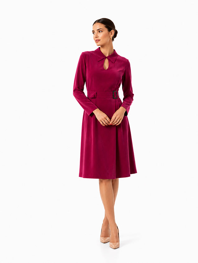 Elegant silk belted dress in rich burgundy colour styled on a brunette woman for the luxury womenswear collection by Moda de la Maria
