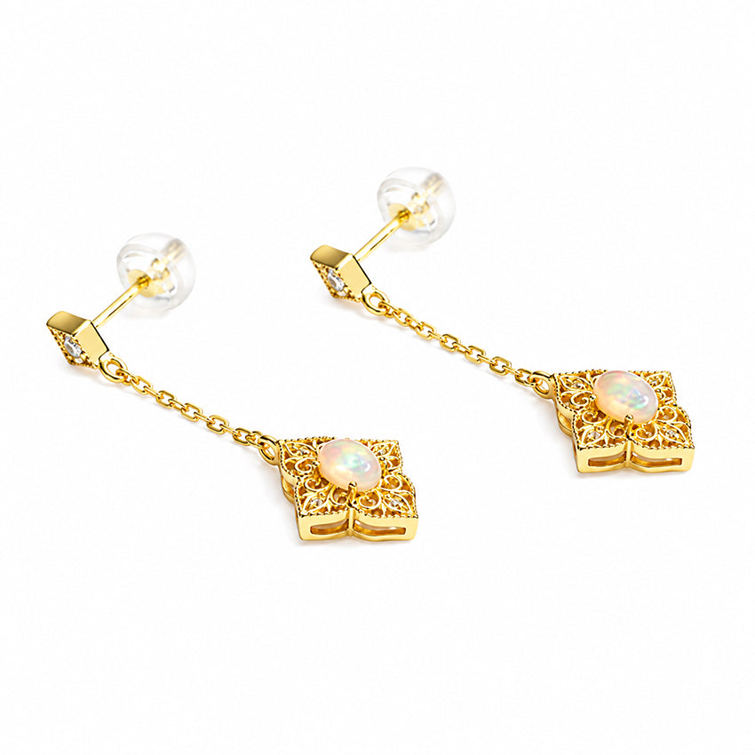 ictorian-style gold-plated opal drop earrings with ornate filigree detailing and sparkling zirconia crystals