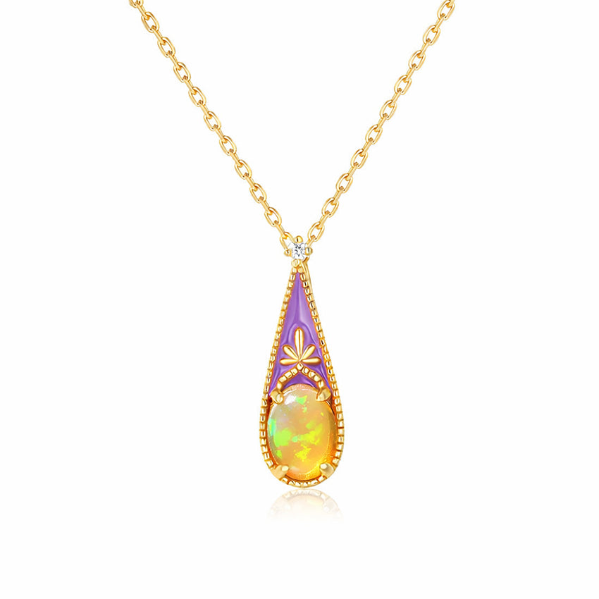 Victorian inspired opal enamel pendant necklace in 925 sterling silver with gold vermeil plating, delicate teardrop opal design on fine chain, isolated on white background
