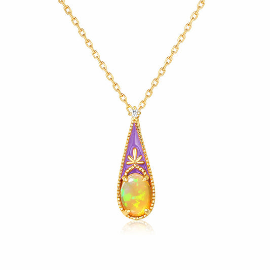 Victorian inspired opal enamel pendant necklace in 925 sterling silver with gold vermeil plating, delicate teardrop opal design on fine chain, isolated on white background
