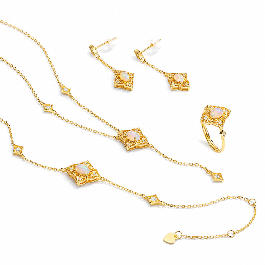 Victorian-style opal jewellery set with gold-plated bracelet, necklace, earrings and ring by Moda de la Maria