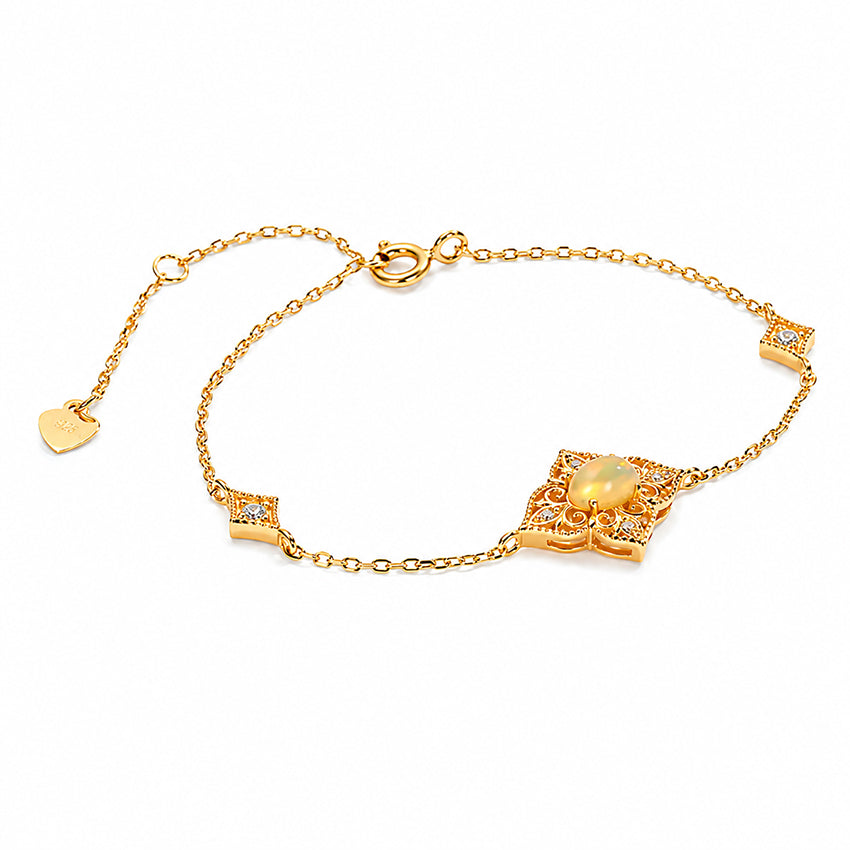 Victorian-style opal bracelet in 18k gold-plated sterling silver with adjustable chain by Moda de la Maria