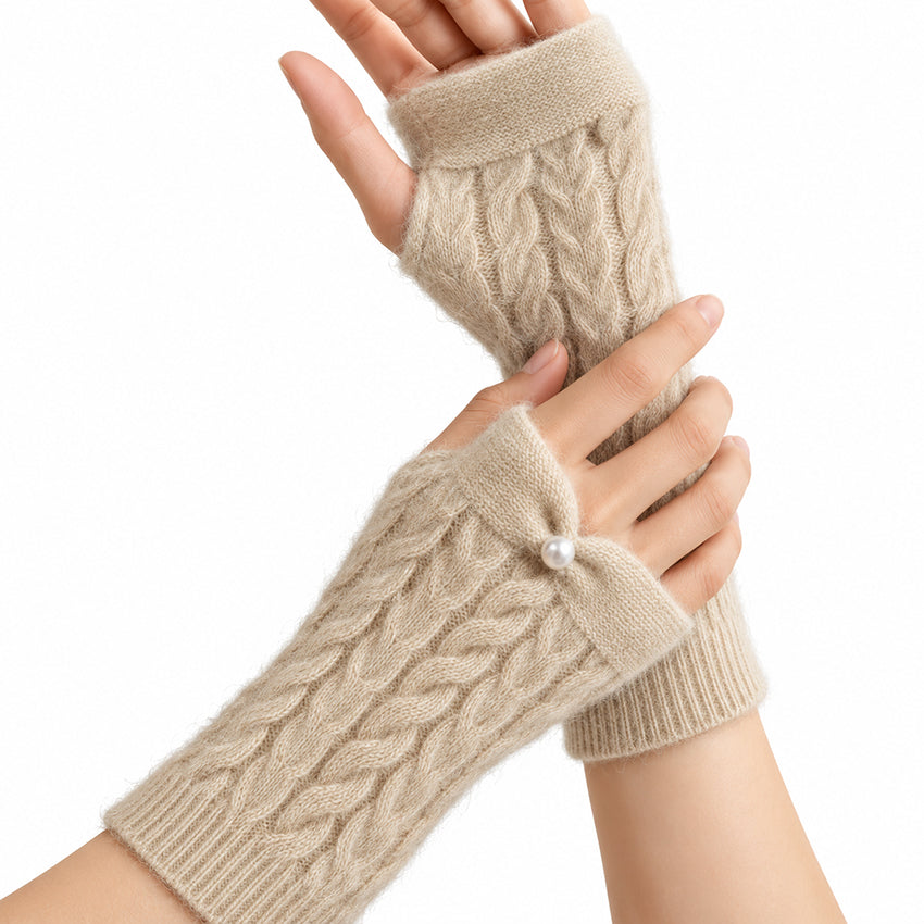 Women’s cream cashmere fingerless gloves with cable knit and pearl detail by Moda de la Maria.